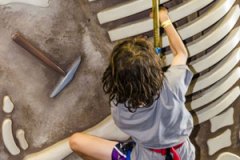 Climbzone-Kids-climbing-dinosaur-bones